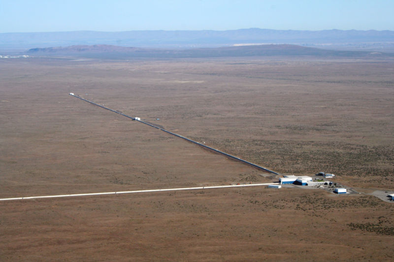 Image of two long arms of the LIGO detector in the desert of eastern Washington.