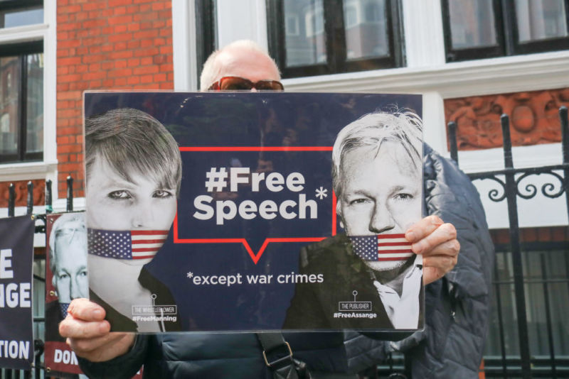 Supporters of Julian Assange protest outside the Ecuadorian embassy as the WikiLeaks founder awaits a High Court hearing to determine whether he will be extradited to Sweden on sexual charges. Now, new US charges have been added to a previous indictment: 17 counts of espionage.