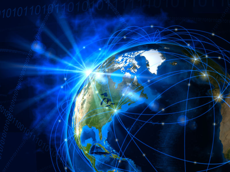 An illustration of the Earth, with lines circling the globe to represent a telecommunications network.