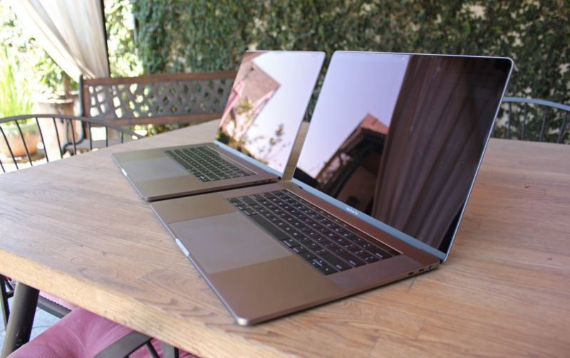 The 2017 and 2018 15-inch MacBook Pros side by side. Each has a butterfly keyboard.