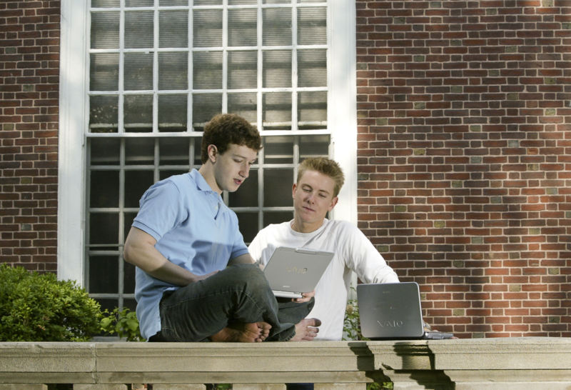 Mark Zuckerberg and Chris Hughes on Harvard's campus in 2004.