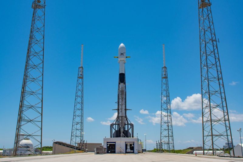 A rocket sits ready on its launchpad.