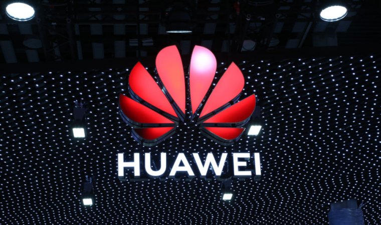 Giant Huawei logo onstage.