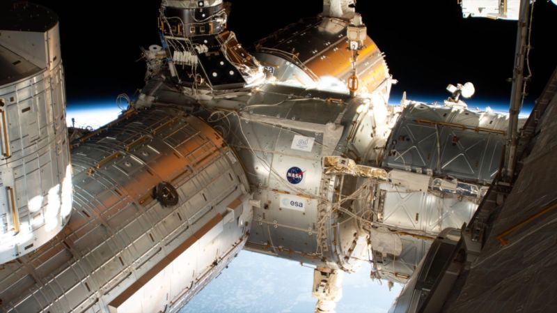 The forward end of the International Space Station is pictured showing portions of five modules. From right to left is a portion of the U.S. Destiny laboratory module linking forward to the Harmony module. Attached to the port side of Harmony (left foreground) is the Kibo laboratory module from the Japan Aerospace Exploration Agency (JAXA) with its logistics module berthed on top. On Harmony's starboard side (center background) is the Columbus laboratory module from ESA (European Space Agency).