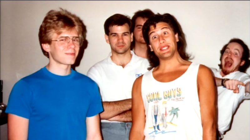 John Carmack (left) and John Romero (second from right) pose with their id Software colleagues in the early '90s. We really hope USA Network's adaptation of their origin story gets this "fashion" just right.