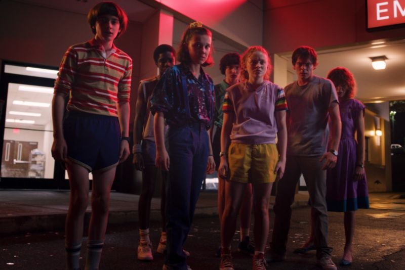 Eleven (Millie Bobby Brown) and the gang are back to face down yet another supernatural threat to Hawkins, Indiana, in the third season of <em>Stranger Things</em>